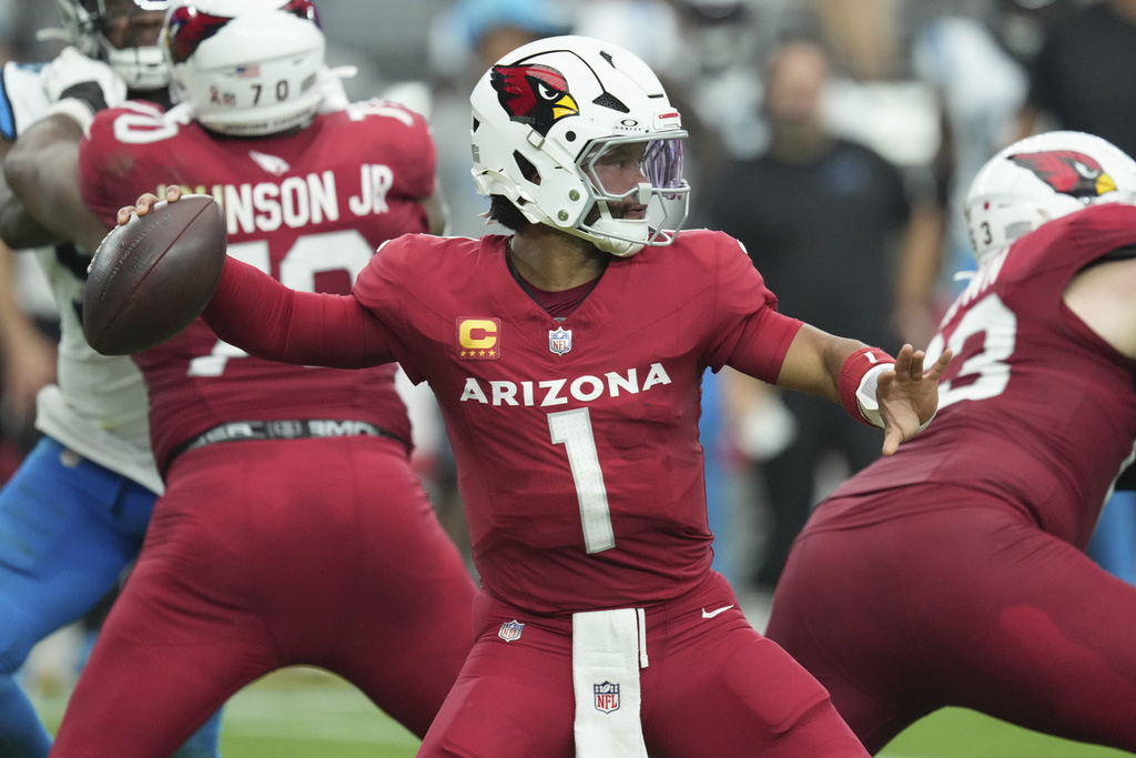 Arizona Cardinals quarterback Kyler Murray (1) throws against the Carolina Panthers during the second half of an NFL football game, Sunday, Sept. 14, 2025, in Glendale, Ariz. (AP Photo/Ross D. Franklin)