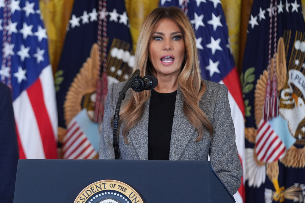 First lady Melania Trump speaks during an event on foster care in the East Room of the at the White House, Thursday, Nov. 13, 2025, in Washington. (AP Photo/Evan Vucci)