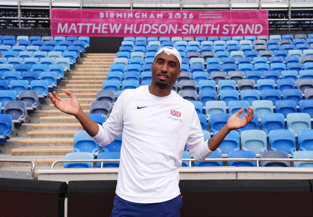 Britain's Matthew Hudson-Smith poses in front of a stand named after him, during a training session ahead of the start of the European Athletics Championships, in Birmingham, England, Sunday, Aug. 9, 2026. (Martin Rickett/PA via AP)