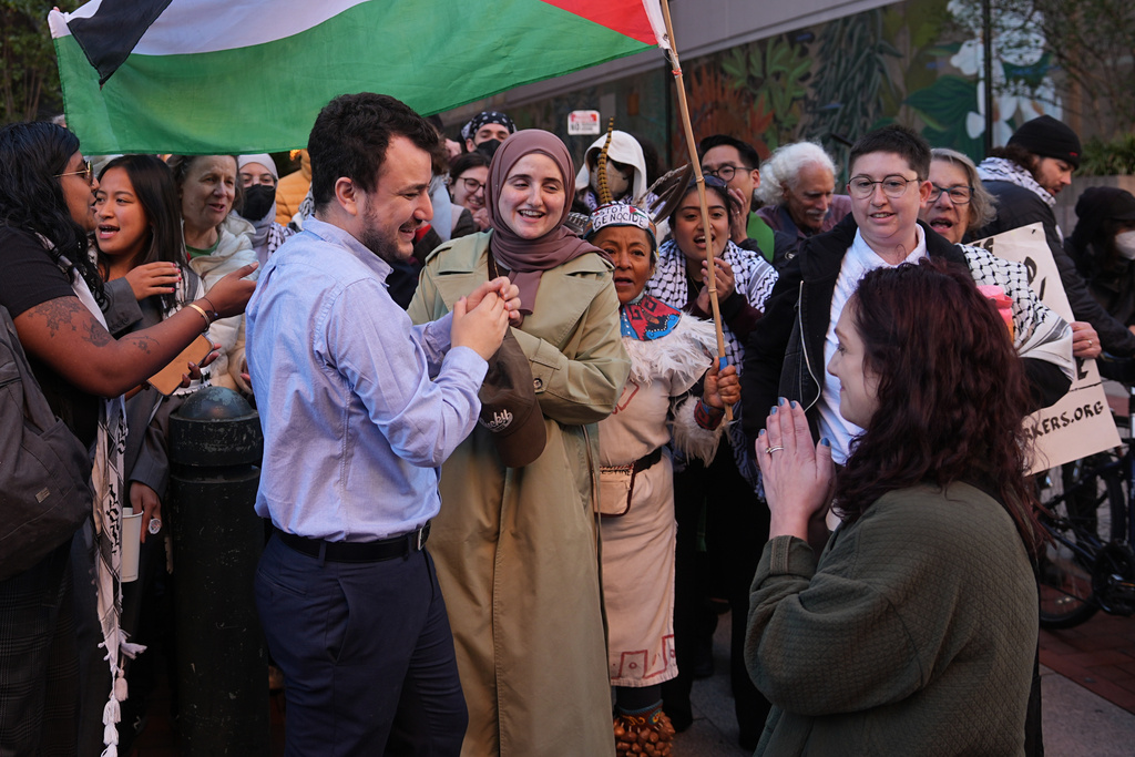 Palestinian activist Mahmoud Khalil meets with supporters outside Federal Court on Tuesday, Oct. 21, 2025 in Philadelphia (AP Photo/Matt Rourke)