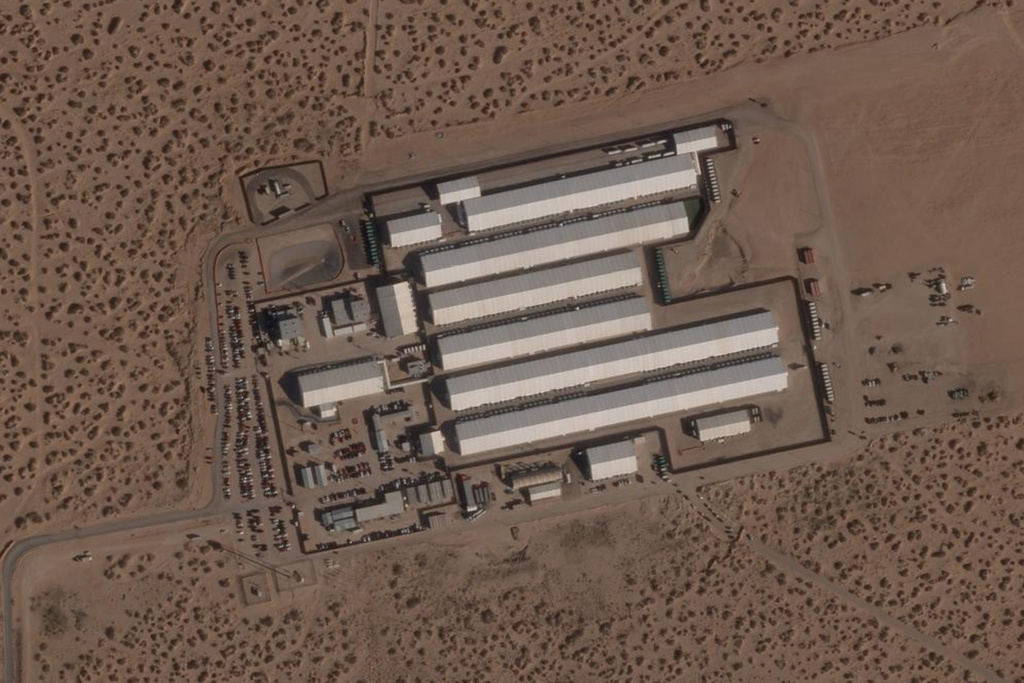 This Wednesday, March 4, 2026, satellite image provided by Planet Labs shows the large white tents and steel fencing at Camp East Montana, an immigrant detention center built by the Trump administration at Fort Bliss, a U.S. Army base outside El Paso, Texas. (Planet Labs via AP)