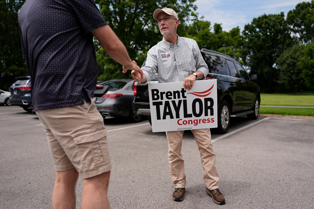 FILE - Republican congressional candidate State Sen. Brent Taylor, R-Memphis, speaks to a supporter outside an early voting polling place Friday, July 24, 2026, in Brentwood, Tenn. (AP Photo/George Walker IV, File)