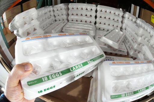 FILE - A shopper selects a carton of 18 Large Grade A eggs from a cooler in a Costco Warehouse in Cranberry, Pa., Jan. 28, 2025. (AP Photo/Gene J. Puskar, File) FILE - A shopper selects a carton of 18 Large Grade A eggs from a cooler in a Costco Warehouse in Cranberry, Pa., Jan. 28, 2025. (AP Photo/Gene J. Puskar, File)