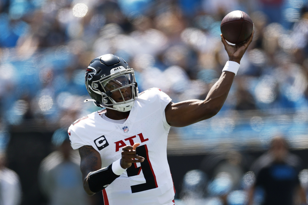 Atlanta Falcons quarterback Michael Penix Jr. passes against the Carolina Panthers during the first half of an NFL football game, Sunday, Sept. 21, 2025, in Charlotte, N.C. (AP Photo/Rusty Jones)