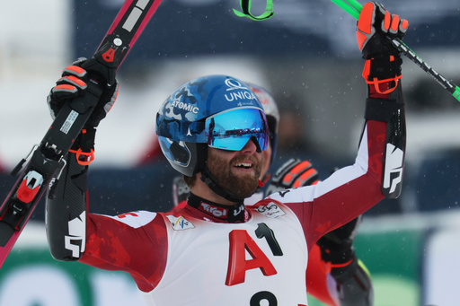 Austria's Marco Schwarz celebrates at the finish area of an alpine ski, men's World Cup giant slalom, in Soelden, Austria, Sunday, Oct. 26, 2025. (AP Photo/Alessandro Trovati) Austria's Marco Schwarz celebrates at the finish area of an alpine ski, men's World Cup giant slalom, in Soelden, Austria, Sunday, Oct. 26, 2025. (AP Photo/Alessandro Trovati)