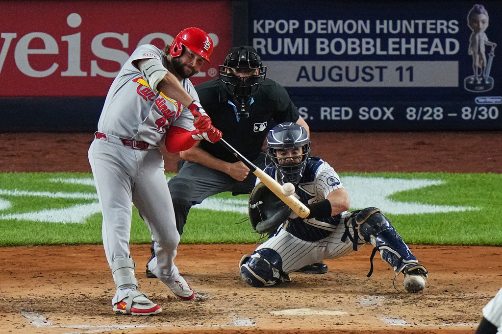 St. Louis Cardinals' Alec Burleson hits a two-run home run during the fourth inning of a baseball game against the New York Yankees Monday, Aug. 3, 2026, in New York. (AP Photo/Frank Franklin II)