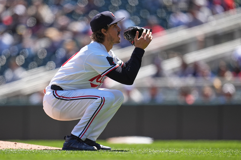 Minnesota Twins starting pitcher Joe Ryan (41) reacts while pitching during the third inning of a baseball game against the Houston Astros, Wednesday, May 20, 2026, in Minneapolis. (AP Photo/Abbie Parr)