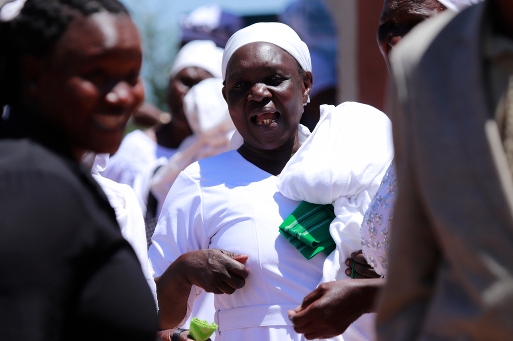 Quakerism faithful walk outside Friends Church Cheptulu in Kaimosi, Kenya after a service, in Kaimosi, Kenya, Sunday, Sept. 20, 2026. (AP Photo/Jackson Njehia)