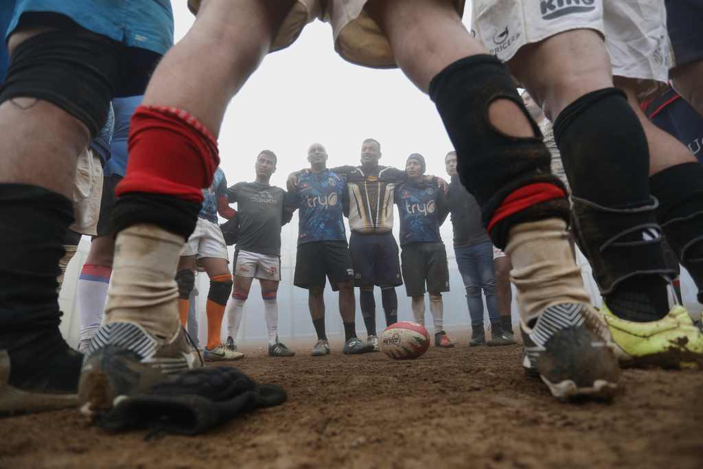 Inmates play rugby at the Valparaiso Prison Complex in Valparaiso, Chile, as part of a social reintegration program, Thursday, Jan. 29, 2026. (AP Photo/Cristobal Escobar)