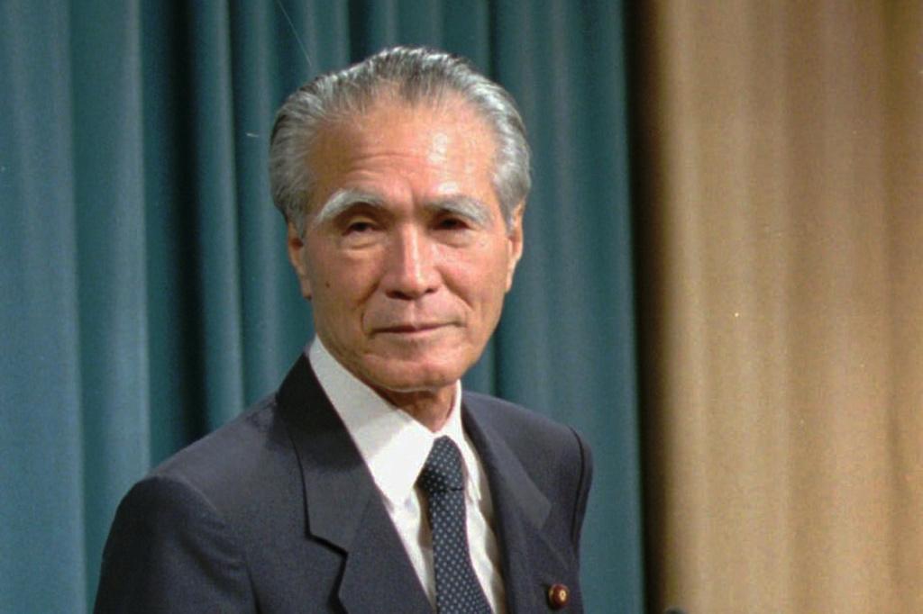 FILE - Japanese Prime Minister Tomiichi Murayama stands before reporters prior to his statement of war remorse at the prime minister's official residence in Tokyo, Aug. 15, 1995. (AP Photo/Naokazu Oinuma, File)