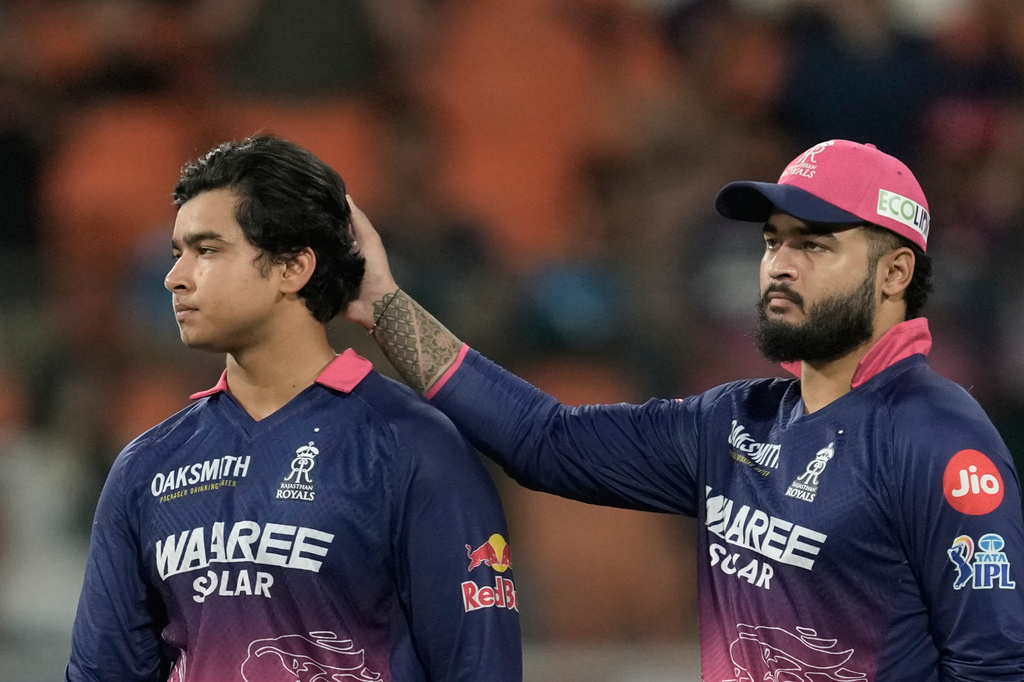 Rajasthan Royals' captain Riyan Parag consoles his teammate Vaibhav Sooryavanshi after Gujarat Titans won against Rajasthan Royals during the Indian Premier League cricket match in New Chandigarh, India, Friday, May 29, 2026. (AP Photo/Ashwini Bhatia)