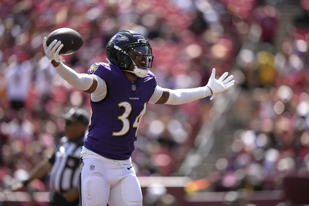 Baltimore Ravens cornerback Thomas Graham Jr. celebrates after intercepting a pass during the second half of a preseason NFL football game Saturday, Aug. 23, 2025, in Landover, Md. (AP Photo/Stephanie Scarbrough)