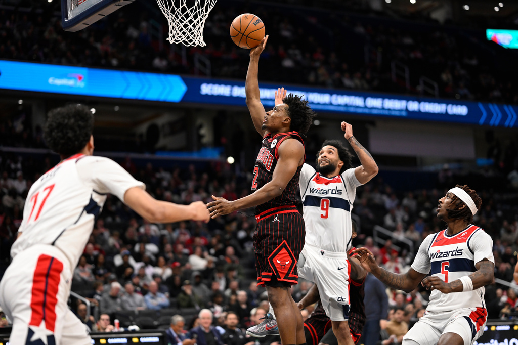 Chicago Bulls guard Collin Sexton goes to shoot during the first half of an NBA basketball game against the Washington Wizards, Tuesday, April 7, 2026, in Washington. (AP Photo/John McDonnell)