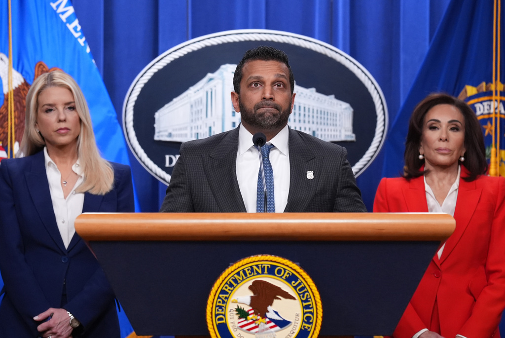 FBI Director Kash Patel, flanked by Attorney General Pam Bondi, left, and Jeanine Pirro, U.S. Attorney for the District of Columbia, appears before reporters at the Justice Department, Friday, Feb. 6, 2026, in Washington, to announce the capture of a key participant in the 2012 attack on a U.S. compound that killed four Americans in Benghazi, Libya. (AP Photo/J. Scott Applewhite)