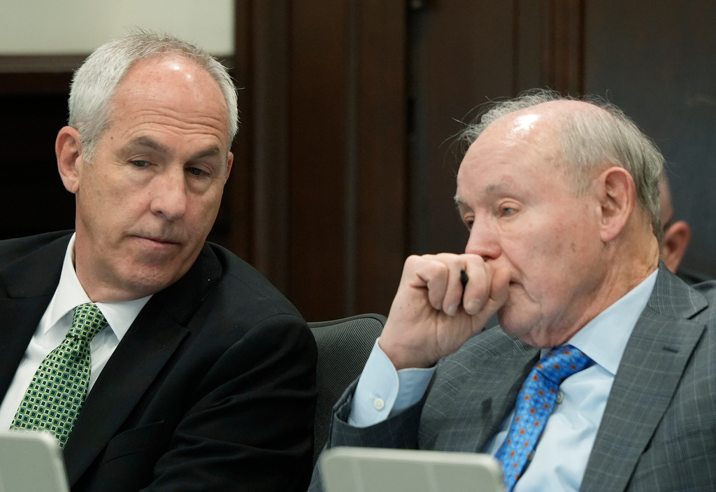 Ex-FirstEnergy Senior Vice President Michael Dowling listens to defense attorney Dan Webb during the closing arguments in former FirstEnergy CEO Chuck Jones' trial in Summit County Common Pleas Judge Susan Baker Ross's courtroom in Akron on Tuesday, March 17, 2026. (Mike Cardew/Akron Beacon Journal via AP, Pool)