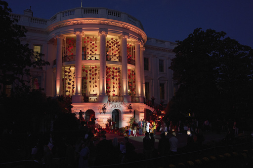 President Donald Trump and first lady Melania Trump greet families during a Halloween event on the South Lawn of the White House, Thursday, Oct. 30, 2025, in Washington. (AP Photo/Jacquelyn Martin) President Donald Trump and first lady Melania Trump greet families during a Halloween event on the South Lawn of the White House, Thursday, Oct. 30, 2025, in Washington. (AP Photo/Jacquelyn Martin)