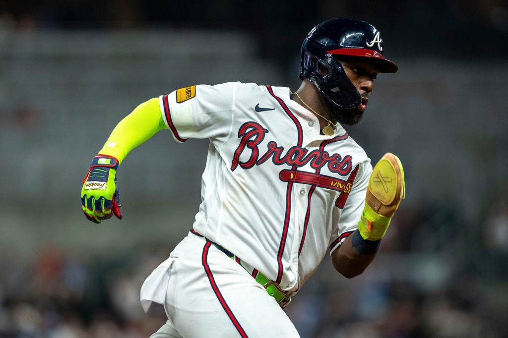 Atlanta Braves center fielder Michael Harris II (23) rounds third base during the eighth inning of a baseball game against the St. Louis Cardinals Wednesday, July 1, 2026, in Atlanta. (AP Photo/Erik Rank)