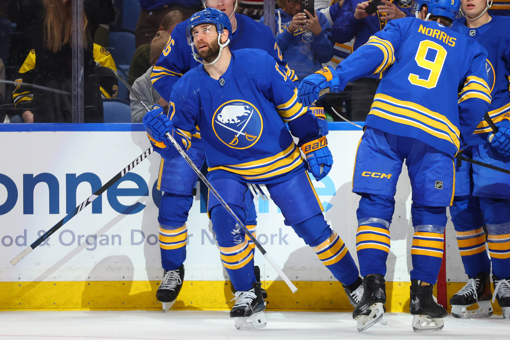 Buffalo Sabres left wing Jason Zucker (17) celebrates his goal during the first period of an NHL hockey game against the Boston Bruins Wednesday, March 25, 2026, in Buffalo, N.Y. (AP Photo/Jeffrey T. Barnes)