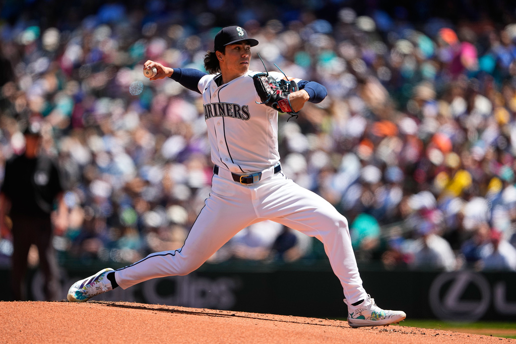 Seattle Mariners starting pitcher Bryan Woo throws against the Baltimore Orioles during the second inning of a baseball game, Thursday, June 18, 2026, in Seattle. (AP Photo/Lindsey Wasson)