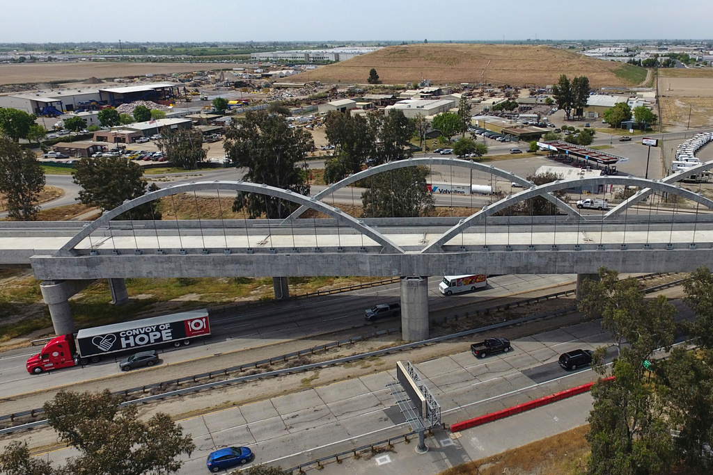 FILE - The Cedar Viaduct, designed to take high-speed trains over Cedar and North avenues and State Route 99, is shown in an aerial view, Tuesday, April 15, 2025, in Fresno, Calif. (AP Photo/Godofredo A. Vásquez, File)