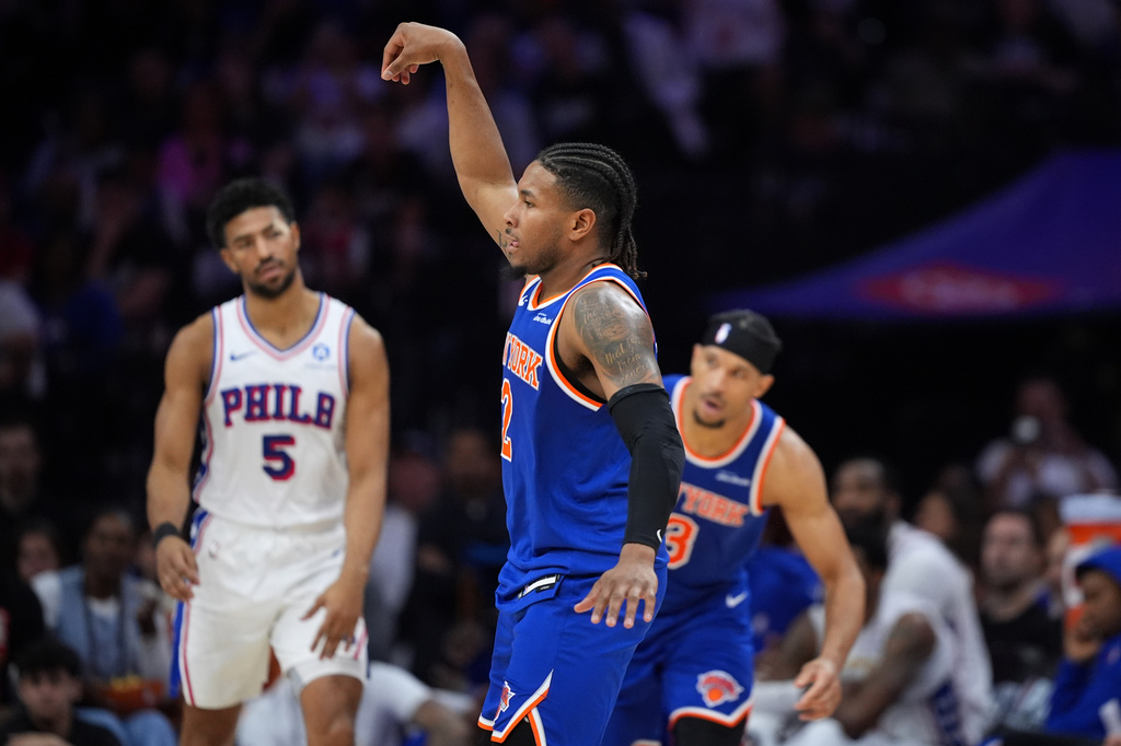 New York Knicks' Miles McBride reacts after scoring during the second half of Game 4 against the Philadelphia 76ers in a second-round NBA basketball playoffs series Sunday, May 10, 2026, in Philadelphia. (AP Photo/Matt Slocum)