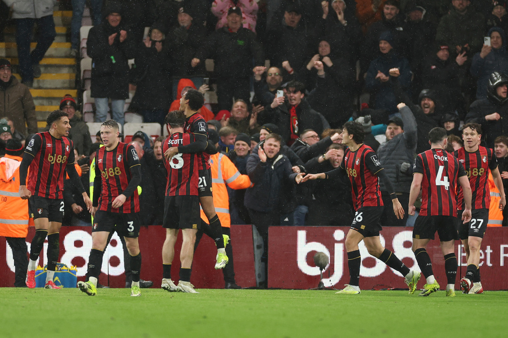 Bournemouth's Amine Adli, center( 21), celebrates with teammates after scoring his sides third goal during the English Premier League soccer match between Bournemouth and Liverpool in Bournemouth, England, Saturday, Jan. 24, 2026. (AP Photo/Ian Walton)