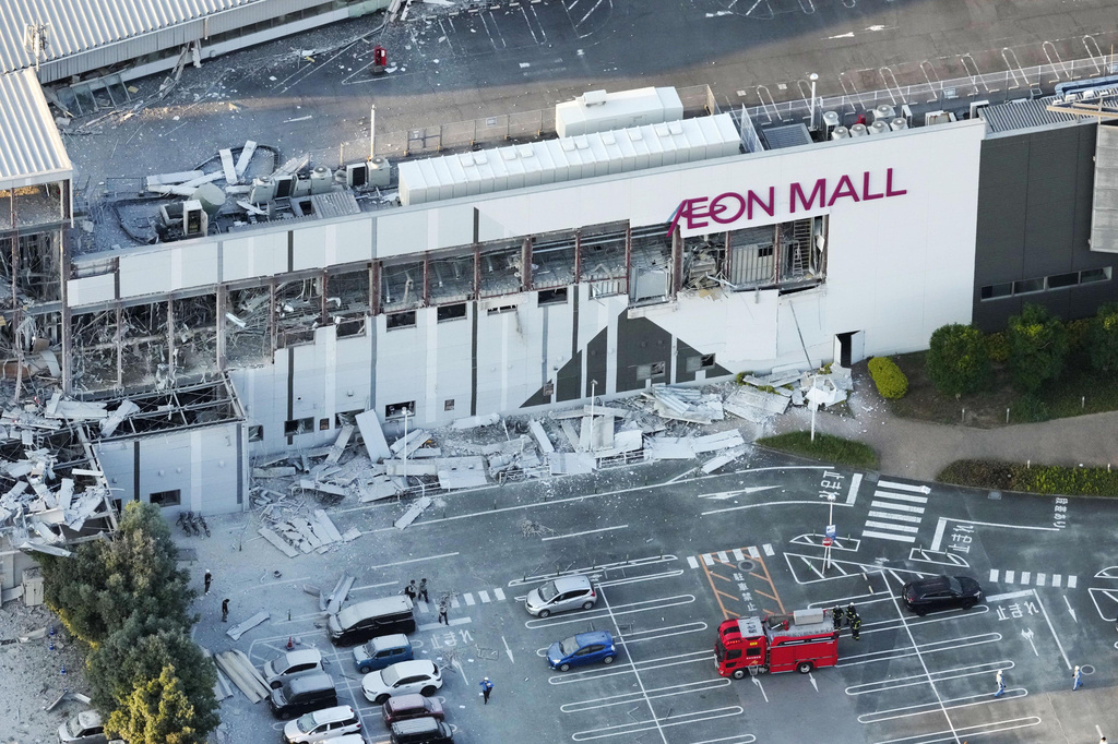 This aerial image shows the damaged AEON Mall after an earthquake in Kashima, Kumamoto prefecture, southern Japan, Tuesday, July 28, 2026. (Kyodo News via AP)
