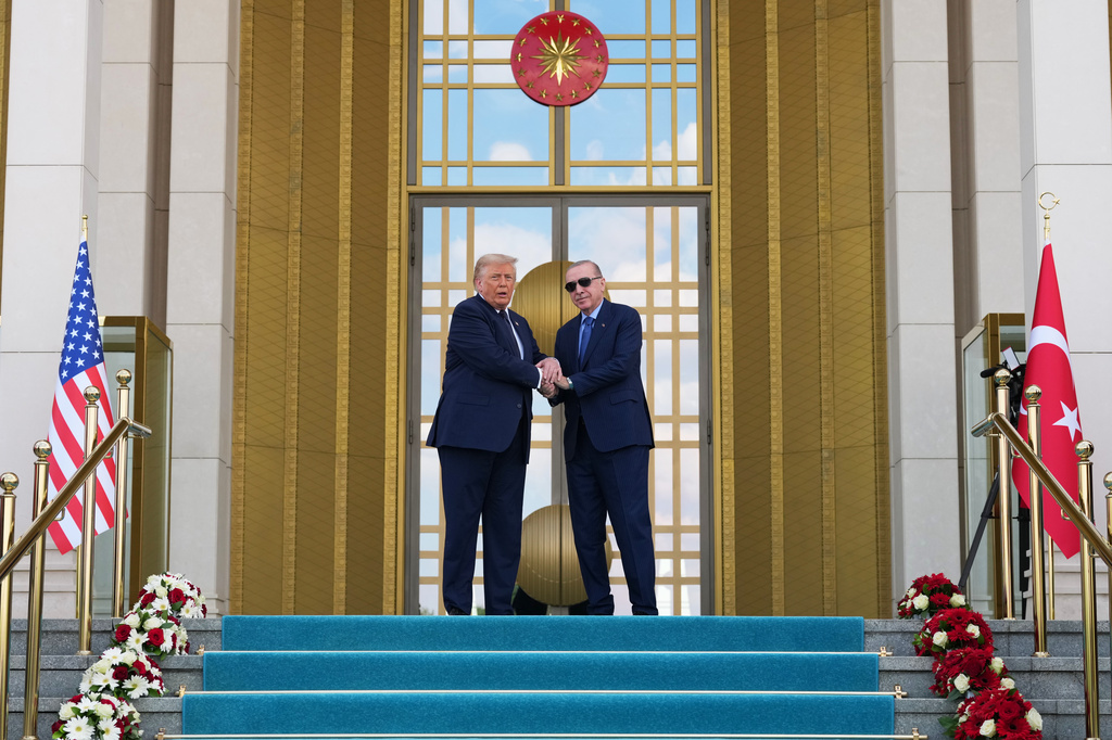 President Donald Trump shakes hands with Turkish President Recep Tayyip Erdogan at the Bestepe Presidential Palace during a formal welcome for the NATO summit in Ankara, Turkey, Tuesday, July 7, 2026.(AP Photo/Alex Brandon)