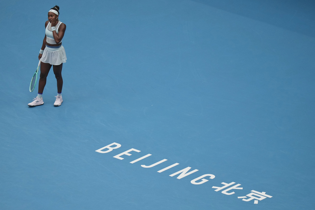 Coco Gauff, of the United States reacts during the women's singles semifinals match against her compatriot Amanda Anisimova, in the China Open tennis tournament, at the National Tennis Center, in Beijing, Saturday, Oct. 4, 2025. (AP Photo/Andy Wong)