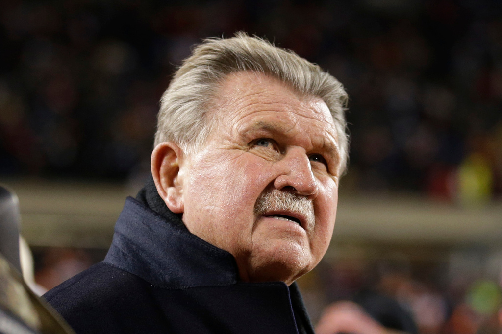 FILE - Former Chicago Bears player and football coach Mike Ditka waits for the halftime ceremony where his No. 89 was to be retired by the Bears during an NFL football game between the Bears and the Dallas Cowboys, Monday, Dec. 9, 2013, in Chicago. (AP Photo/Nam Y. Huh, File)