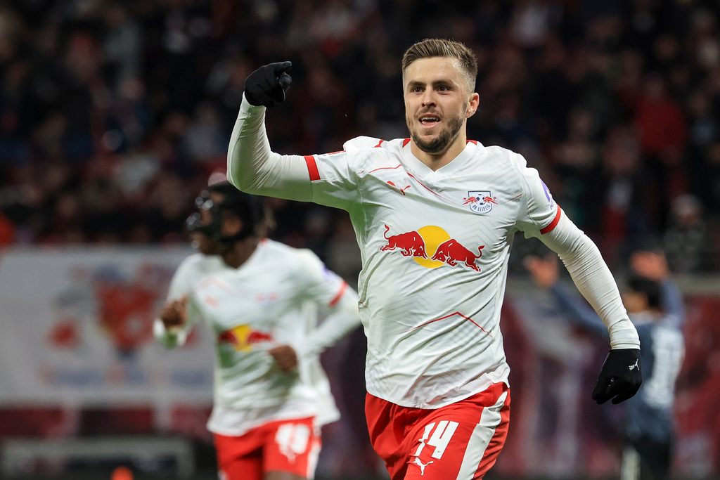 Leipzig's Christoph Baumgartner celebrates after scoring his side's second goal during the German Bundesliga soccer match between RB Leipzig and Eintracht Frankfurt in Leipzig, Germany, Saturday, Dec. 6, 2025. (Jan Woitas/dpa via AP)
