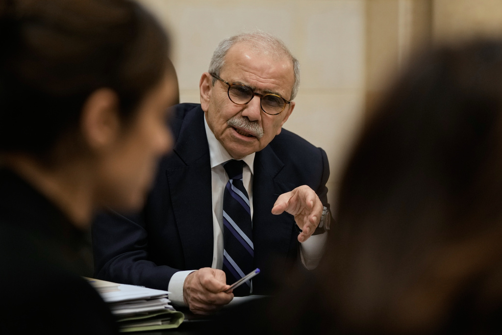 Lebanese Prime Minister Nawaf Salam meets with journalists working for foreign media and news agencies at the government palace in Beirut, Wednesday, Dec. 3, 2025. (AP Photo/Bilal Hussein)