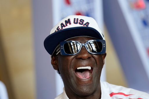 FILE - Flavor Flav laughs during an interview with The Associated Press at the USA house at the 2024 Summer Olympics, July 25, 2024, in Paris, France. (AP Photo/Luca Bruno, file) FILE - Flavor Flav laughs during an interview with The Associated Press at the USA house at the 2024 Summer Olympics, July 25, 2024, in Paris, France. (AP Photo/Luca Bruno, file)