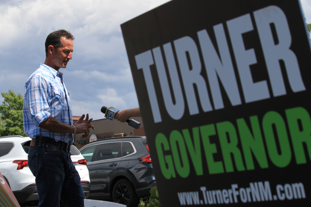 Republican gubernatorial candidate Doug Turner answers a reporter's questions while campaigning in Albuquerque, N.M., on Tuesday, June 2, 2026. (AP Photo/Susan Montoya Bryan)