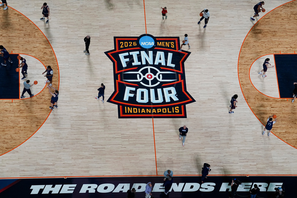 UConn players run drills during practice ahead of a national semifinal NCAA college basketball tournament game against Illinois at the Final Four, Friday, April 3, 2026, in Indianapolis. (AP Photo/Jeff Roberson)