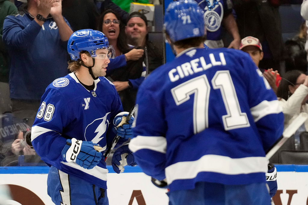 Tampa Bay Lightning left wing Brandon Hagel (38) celebrates his goal against the San Jose Sharks with center Anthony Cirelli (71) during the second period of an NHL hockey game Tuesday, Jan. 20, 2026, in Tampa, Fla. (AP Photo/Chris O'Meara)