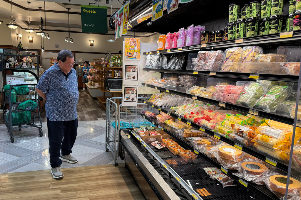 A customer shops at a grocery store in Arlington Heights, Ill., Monday, July 6, 2026. (AP Photo/Nam Y. Huh)