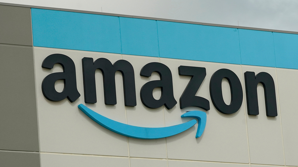 FILE - The Amazon logo is pictured at the Amazon Robotic Sorting Fulfillment Center in Madison County, Miss., Aug. 11, 2022. (AP Photo/Rogelio V. Solis, File)