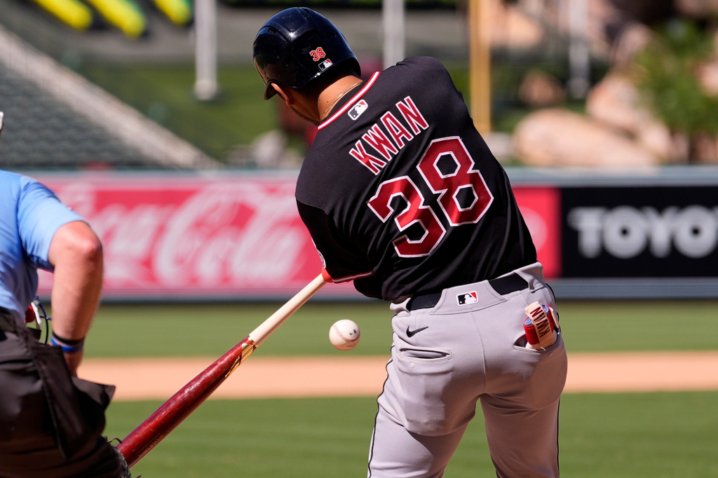 Cleveland Guardians' Steven Kwan hits an RBI ground run double during the ninth inning of a baseball game against the Los Angeles Angels, Wednesday, Aug. 26, 2026, in Anaheim, Calif. (AP Photo/Mark J. Terrill)