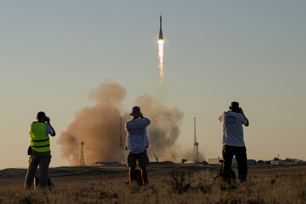 The Soyuz rocket launches to the International Space Station with Expedition 75 crew members: NASA astronaut Anil Menon, Roscosmos cosmonauts Pyotr Dubrov, and Anna Kikina onboard, Tuesday, July 14, 2026 at the Baikonur Cosmodrome in Kazakhstan. (Bill Ingalls/NASA via AP)