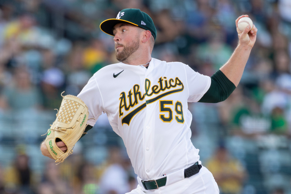 Athletics pitcher Jeffrey Springs throws to the Detroit Tigers during the first inning of a baseball game Friday, July 31, 2026, in West Sacramento, Calif. (AP Photo/Sara Nevis)