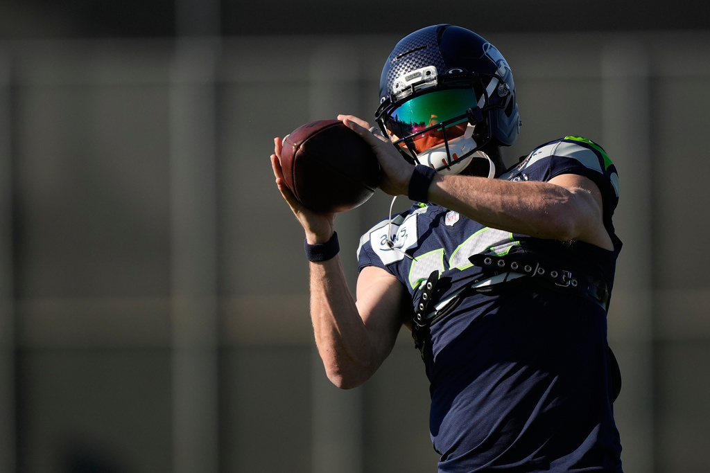 Seattle Seahawks wide receiver Cooper Kupp (10) runs drills during an NFL Super Bowl football practice on Wednesday, Feb. 4, 2026, in San Jose, Calif., ahead of Super Bowl 60 between the New England Patriots and the Seattle Seahawks. (AP Photo/Brynn Anderson)
