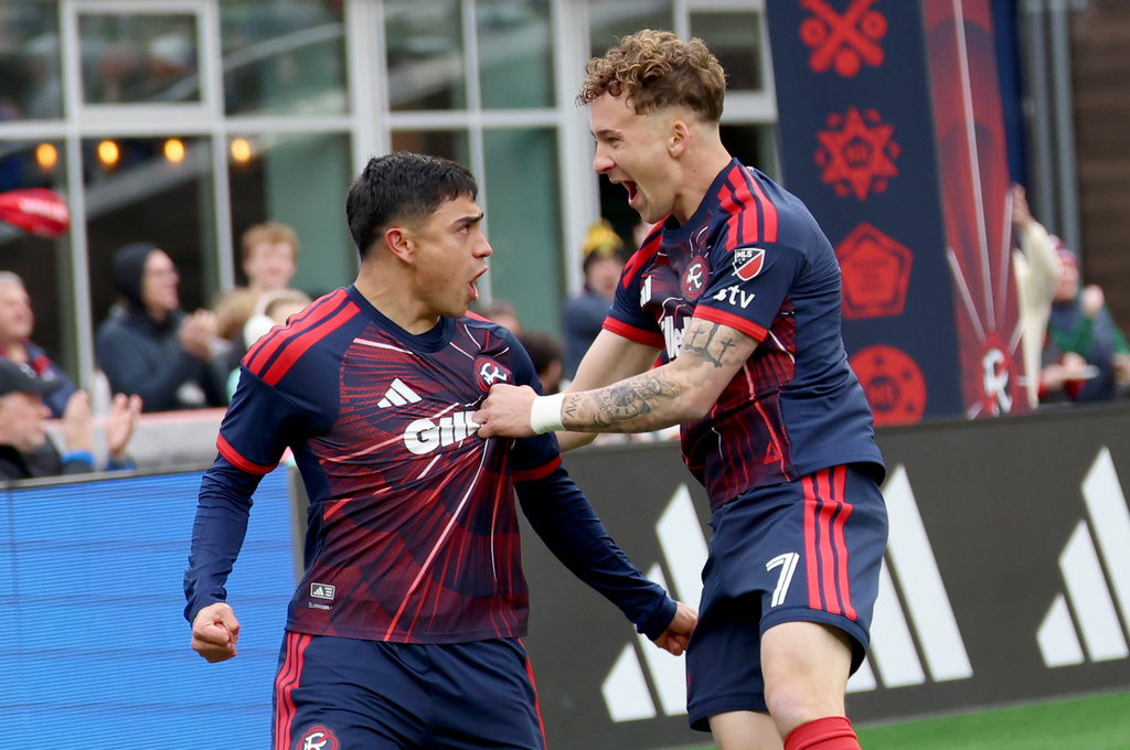 New England Revolution forward Luca Langoni (41) and teammate Griffin Yow (7) celebrate Langoni's goal in the first half of an MLS soccer match against CF Montreal, Saturday, April 4, 2026, in Foxborough, Mass. (AP Photo/Mark Stockwell)