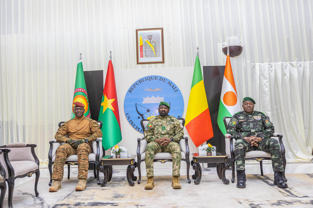 FILE - Captain Ibrahim Traoré of Burkina Faso, left, General Assimi Goïta of Mali, center, and General Abdourahamane Tchiani of Niger attend the second summit on security and development in Bamako, Mali, Tuesday, Dec. 23, 2025. (Mali Government Information Center via AP, File)