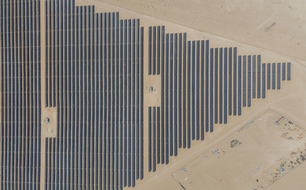 This aerial photo shows panels at a newly opened industrial-scale solar power plant in Karbala, Iraq, Wednesday, Sept. 17, 2025. (AP Photo/Anmar Khalil)