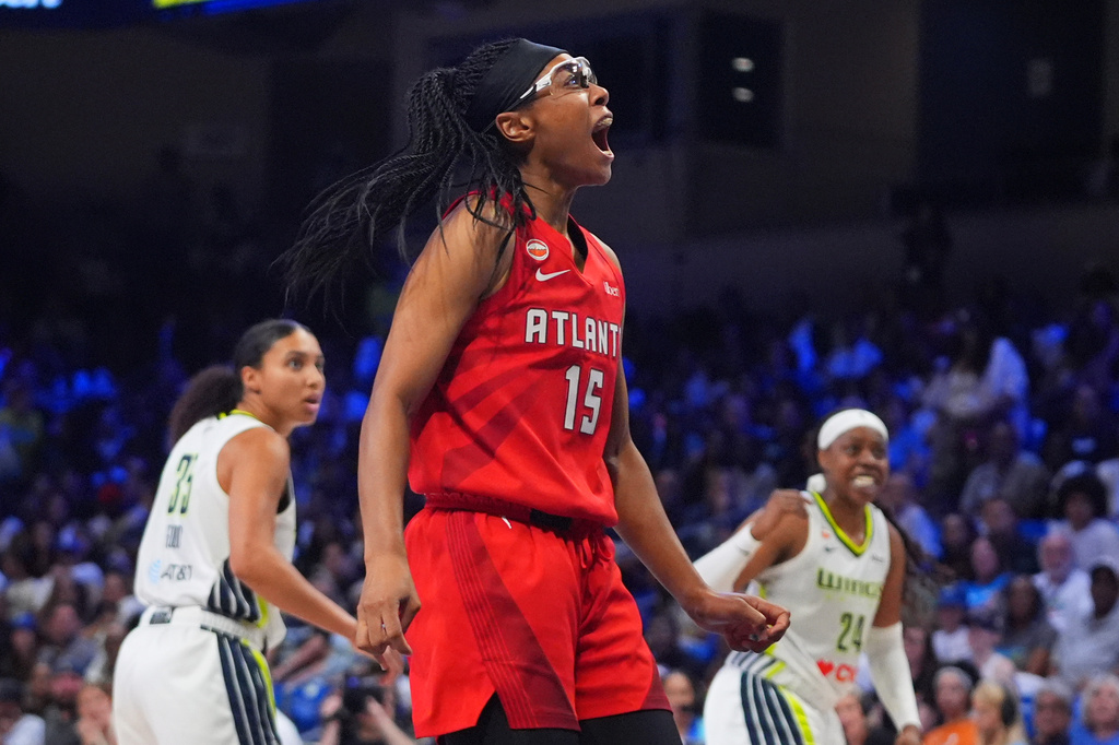 Atlanta Dream guard Allisha Gray (15) reacts to scoring a basket during the second half of a WNBA basketball game against the Dallas Wings in Arlington, Texas, Wednesday, July 29, 2026. (AP Photo/LM Otero)