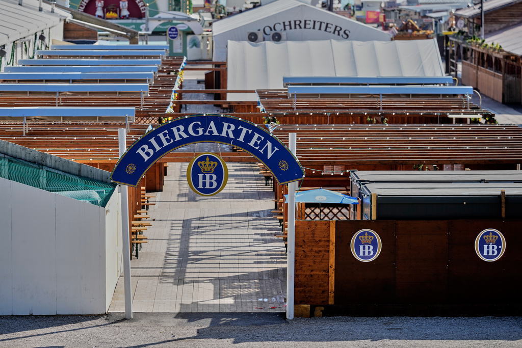 An empty Biergarten at he Oktoberfest area that stays closed after a bomb threatening in Munich, Germany, Wednesday, Oct.1, 2025. (AP Photo/Matthias Schrader)