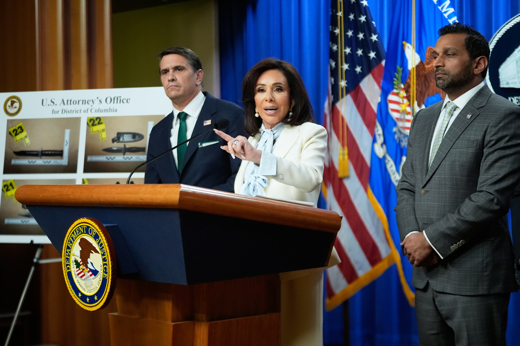 From left, Acting Attorney General Todd Blanche, U.S. Attorney Jeanine Pirro and FBI Director Kash Patel, speak during a news conference at the Department of Justice, on Monday April 27, 2026, in Washington, following the initial appearance in federal court of the suspected White House Correspondents Dinner gunman, Cole Tomas Allen of Torrance, California. (AP Photo/Manuel Balce Ceneta)