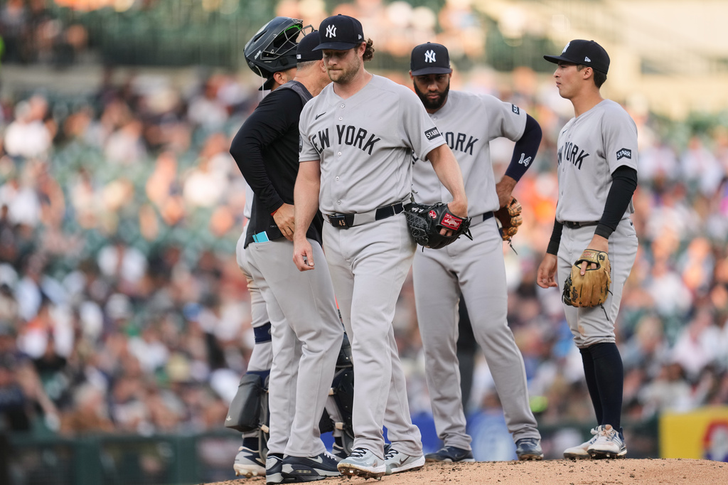 New York Yankees pitcher Gerrit Cole walks to the dugout against the Detroit Tigers during the fifth inning of a baseball game Monday, June 22, 2026, in Detroit. (AP Photo/Paul Sancya)