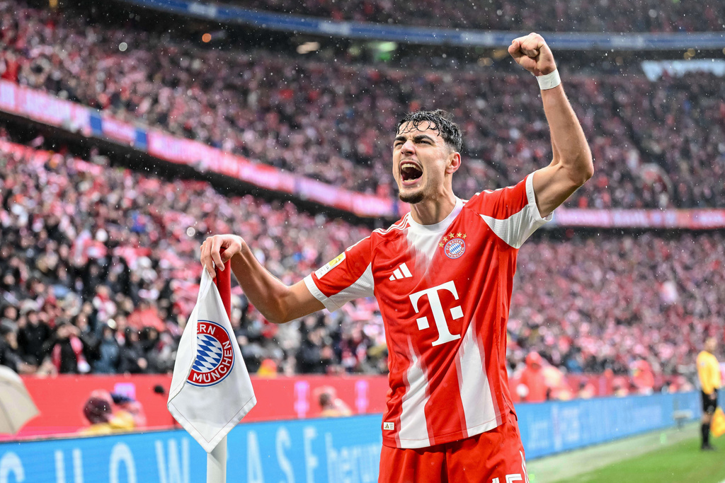Bayern Munich's Aleksandar Pavlovic celebrates scoring during the Bundesliga soccer match between Bayern Munich and Eintracht Frankfurt in Munich, Germany, Saturday Feb. 21, 2026. (Harry Langer/dpa via AP)